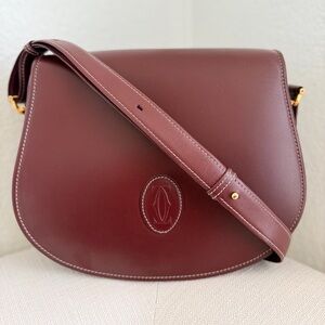 Cartier Must de Cartier Burgundy Leather Saddle crossbody bag